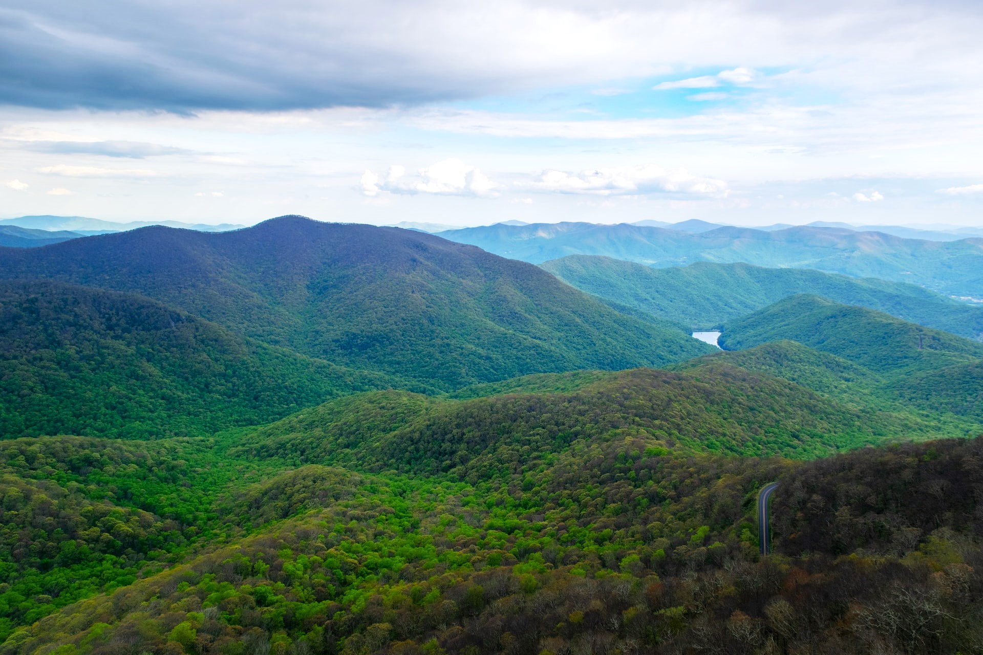 photo of mountains, blue-green and hazy